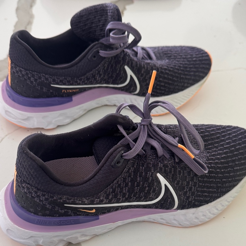 Nike Women’s Dark Purple and Orange Flyknit Running Shoes